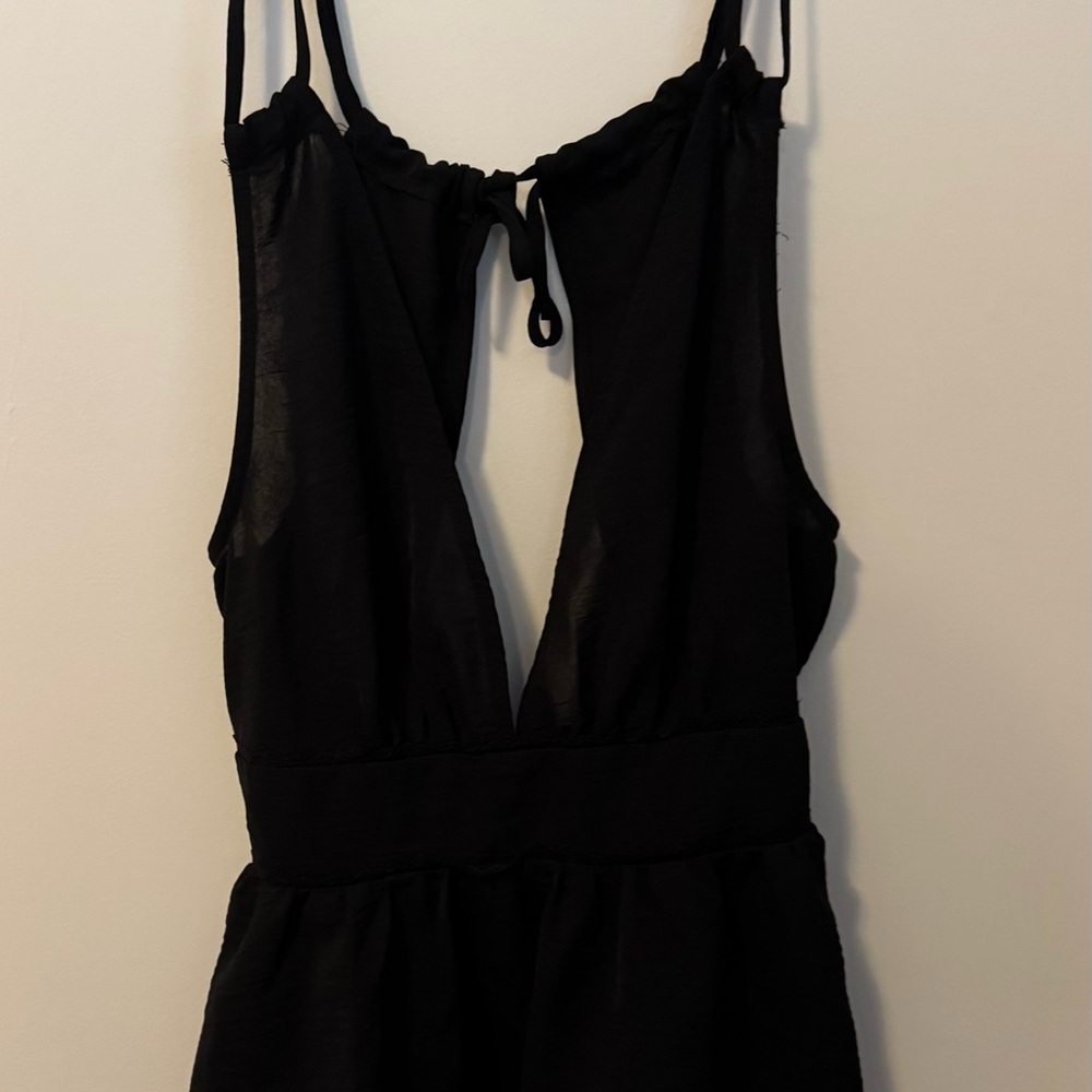 SHEIN Black top with open back and peplum waist